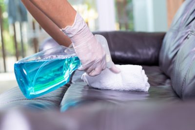 cleaning-leather-sofa-home-protective-covid-19-covid-19-coronavirus-outbreak-concept_101840-558.jpg
