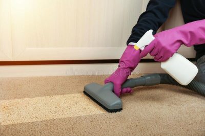 carpet-cleaning-concept-cleaner-s-hand-gloves-sprays-cleaning-agent-carpet-vacuums-clean-line-carpet-179756179.jpg
