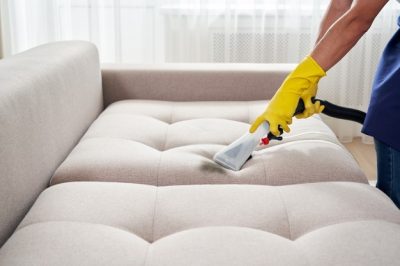 close-up-housekeeper-holding-modern-washing-vacuum-cleaner-cleaning-dirty-sofa-with-professionally-detergent-professional-springclean-home-concept_130111-3654.jpg